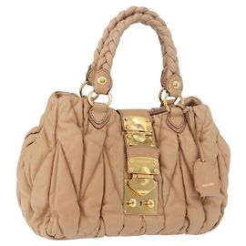 Borsa a mano Miu Miu Matelasse in pelle beige oro Auth 191692A