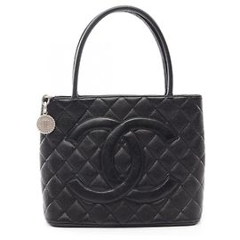 Borsa Tote Chanel Reissue in pelle di vitello martellata nera