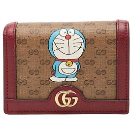 Cartera Bi-fold Mini GG Supreme Doraemon Gucci