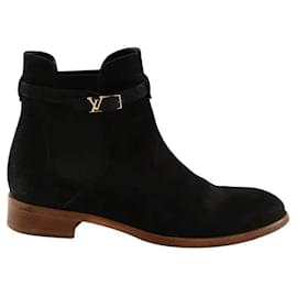 Stivali Louis Vuitton in pelle nera con fibbia