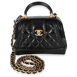 Clutch Nano Cocodoc in agnello lucido trapuntato nero Chanel con catena