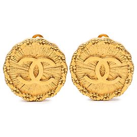 Orecchini Chanel Gold CC placcati oro Sunburst rotondi con clip