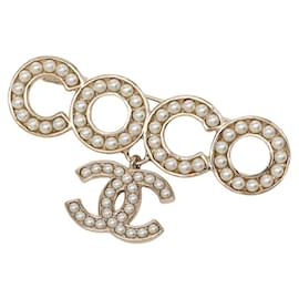Spilla Chanel Coco Mark placcata oro