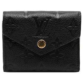 Cartera tríptico Zoe en Monogram Empreinte Louis Vuitton