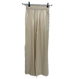 Elia Essentials. Pantalones de satén beige Elia Essentials Viscosa