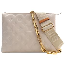 Louis Vuitton Coussin PM in pelle di agnello con monogramma in rilievo bianco