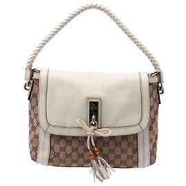Bolso Bella Flap en lona GG beige de Gucci