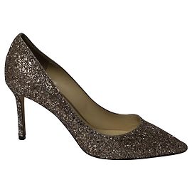 Jimmy Choo Romy Pumps aus goldenem Glitzertüll