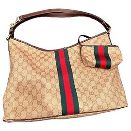 Bolso Hobo de lona Monogram Gucci con pochette
