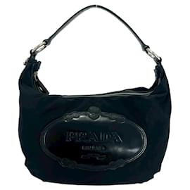 Borsa a tracolla in nylon e pelle con logo in rilievo Prada