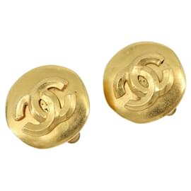 Orecchini CHANEL Metallo Tonalità Oro CC Auth 189409