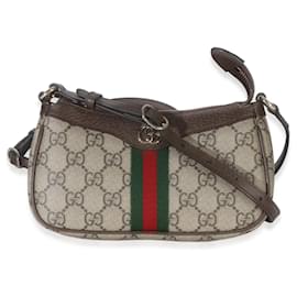 Sac à bandoulière mini Ophidia en toile monogramme GG Supreme ébène et beige Gucci