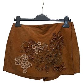 Minifalda-pantalón de ante Ermanno Scervino con aplique floral
