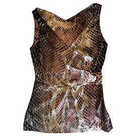 Top de seda con estampado de serpiente Roberto Cavalli con detalle de serpiente dorado