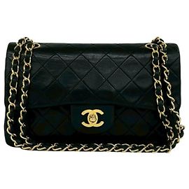 Borsa a tracolla Chanel Double Flap Matelassé in pelle di agnello nera