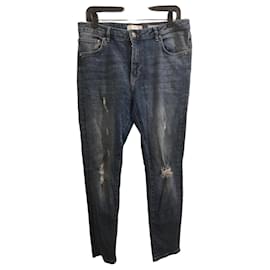 Met Vaqueros slim azul lavado con rotos