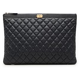 Clutch Chanel Blue Large Quilted Caviar Boy O Case