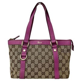 Bolsa de mão Gucci em lona GG e couro