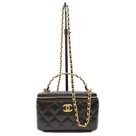 Borsa a tracolla e beauty case in pelle di agnello nera Chanel