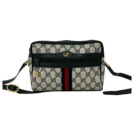 Borsa a tracolla Gucci GG in PVC e pelle