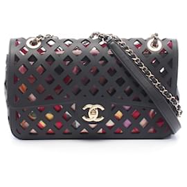 Borsa a tracolla Chanel in agnello nero traforato