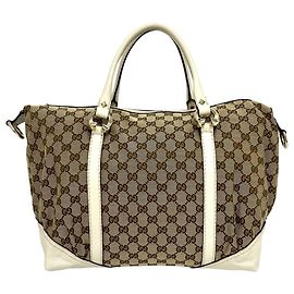 Borsa Boston Gucci con motivo GG e ferramenta a ferro di cavallo