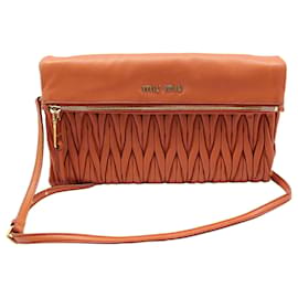 Miu Miu Clutch crossbody in nappa trapuntata arancione e rosa