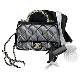 Chanel Mini borsa con patta e manico nera e oro