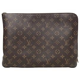 Louis Vuitton Clutch Etui Voyage in Tela Monogram