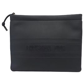 Dior Clutch in pelle con logo in rilievo e strisce con scritte nere