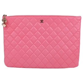 Chanel Clutch grande in pelle di agnello placcata oro CC rosa