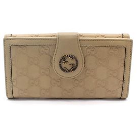 Gucci Portafoglio lungo beige con borchie logo GG