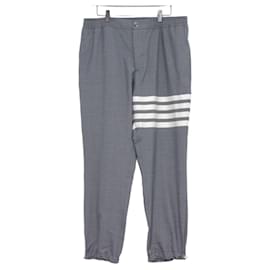 Thom Browne Pantaloni in lana grigio medio con strisce a quattro barre