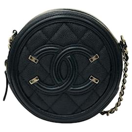 Chanel Serie de mini bolsos bandolera redondos de caviar cosmético