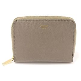 Céline Portafoglio compatto con zip in pelle di vitello granulata grigio pebble