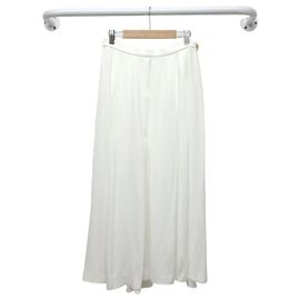 Louis Vuitton Falda midi tennis dorada entallada blanca