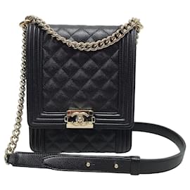 Borsa Chanel serie Boy in caviar nero e oro champagne