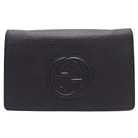 Clutch e borsa a tracolla con catena Gucci