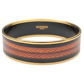 Bracciale rigido con motivo intrecciato bicolore placcato oro - Hermès