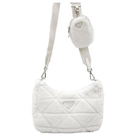Prada Borsa a tracolla e crossbody in shearling bianco con logo triangle