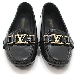 Louis Vuitton Mocassini da guida in vernice nera con logo LV dorato