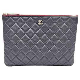 Chanel Clutch Classic New Medium in Caviar Nero e Oro