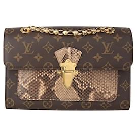 Borsa a tracolla Victorine in pitone monogrammato con catena dorata - Louis Vuitton