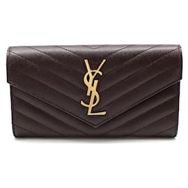 Langer Caviar-Geldbeutel in Burgundy mit goldener Monogramm-Prägung - Saint Laurent