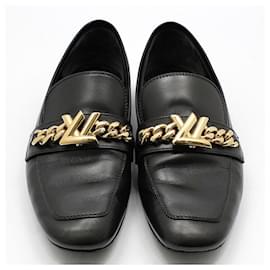 Louis Vuitton Mocassino flat LV Gold Upper Case nero
