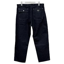 Pantaloni in denim a gamba larga con motivo chevron - Prada