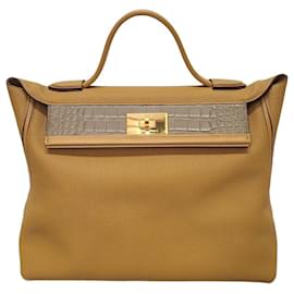 Hermès Kelly Tasche aus Alligator Togo Swift Gold Karamell