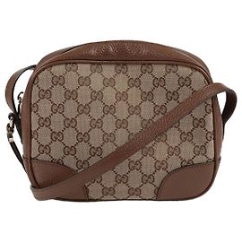 Gucci Borsa a tracolla e a spalla Disco in tela jacquard GG con bordi in pelle marrone
