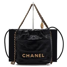 Chanel Mini borsa a tracolla e borsa a tracolla in metallo dorato