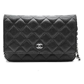 Chanel Mini borsa a tracolla WOC in Caviar
